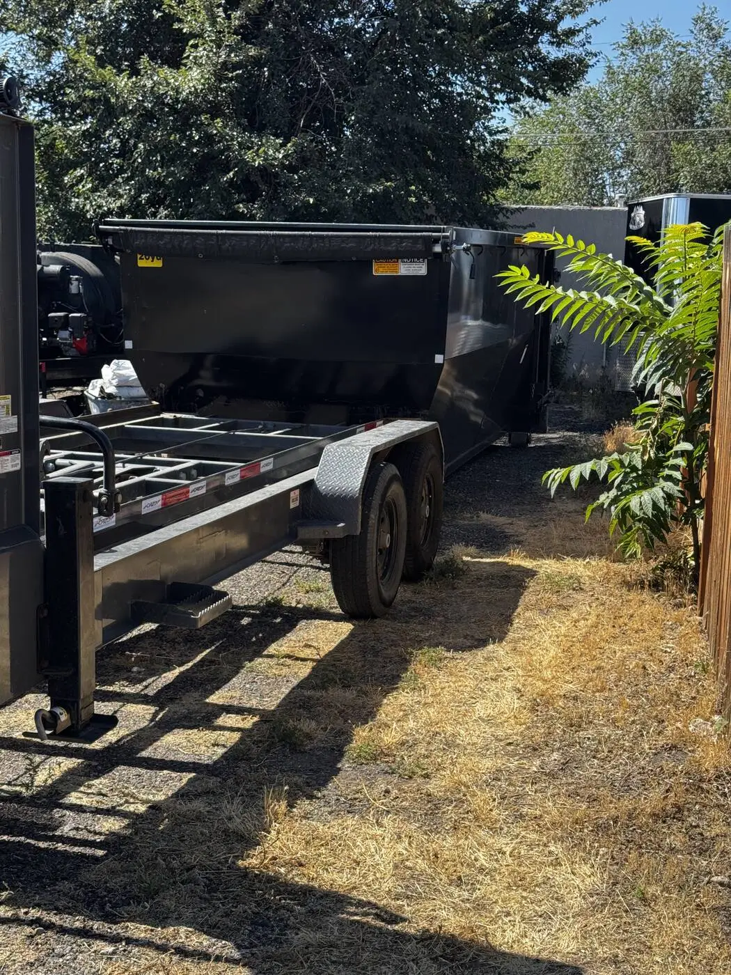 Dumpster set beside a home for a local cleanout